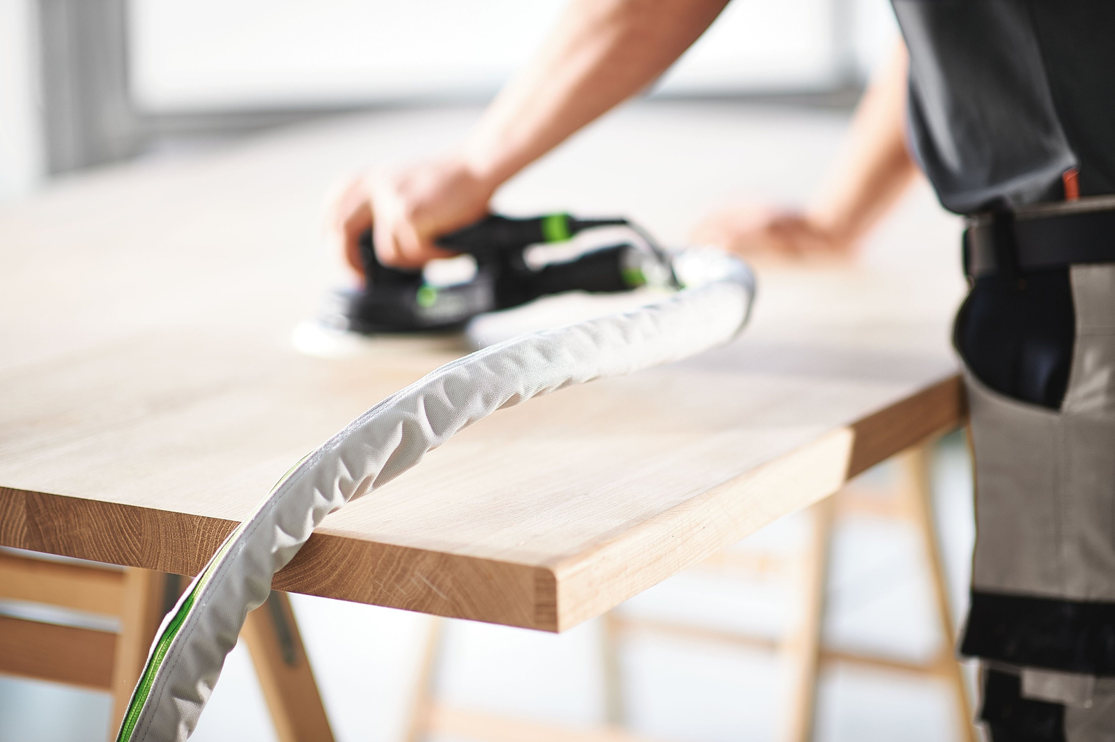 [Image of Możliwość podłączenia odsysu w szlifierce Festool]